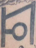 Mysterious symbol tattoo